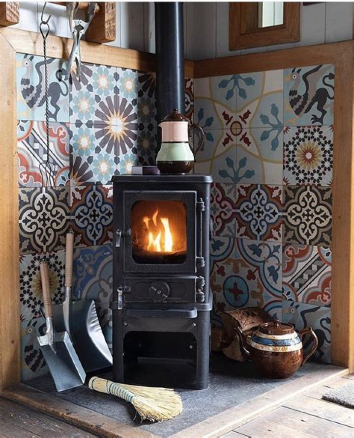 Can I tile behind a wood burning stove?