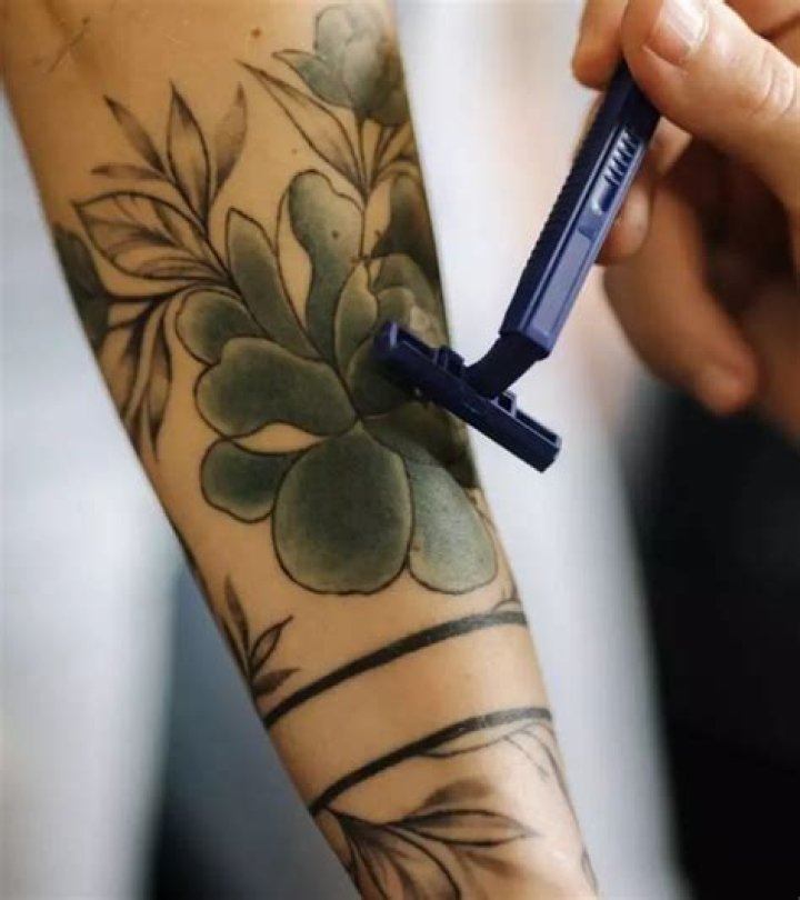 Does shaving over a tattoo damage it?