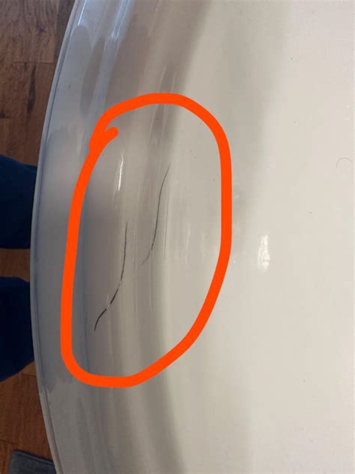 How do you remove scratches from CorningWare?