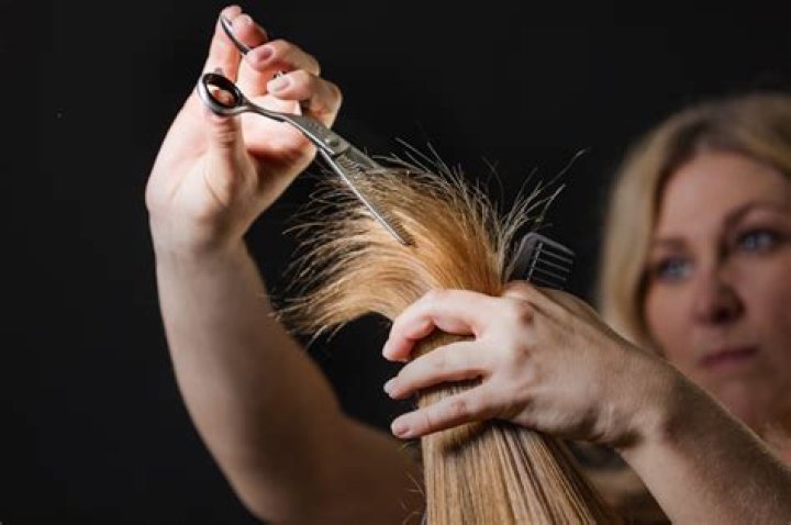 Is it OK to cut facial hair with scissors?