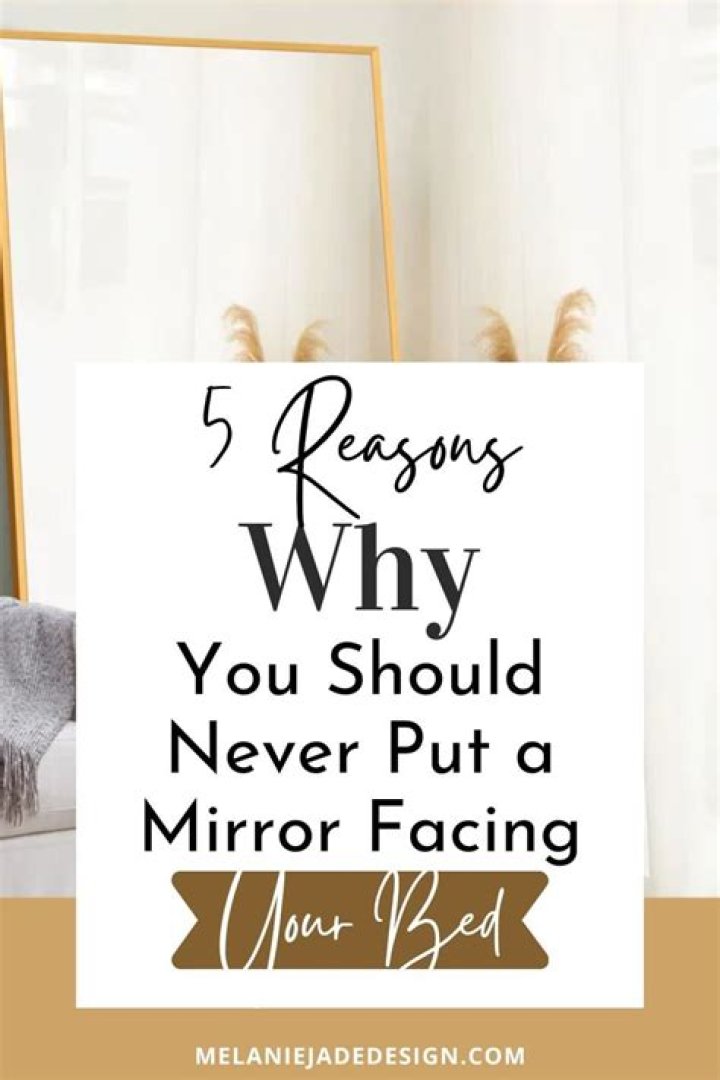Is it OK to have a mirror facing the door?