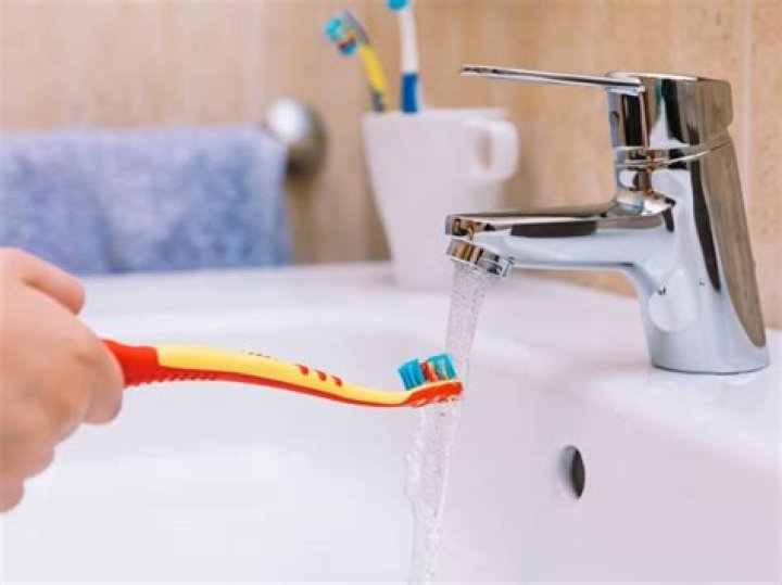 Should you wet your toothbrush before brushing?