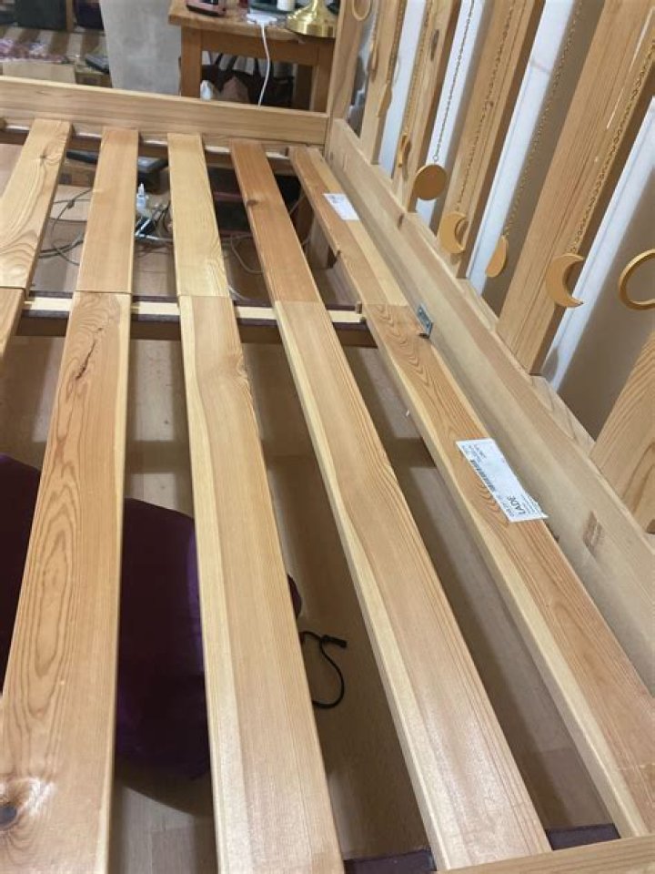 Why is my wooden bed creaking?